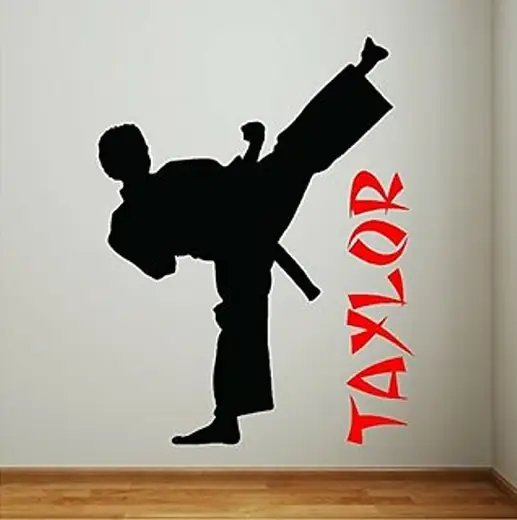 White wall with a black martial-arts silhouette and red name lettering